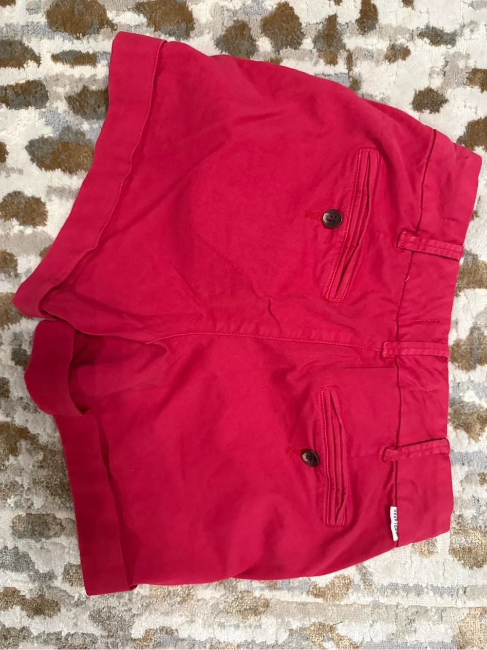 Dear John cuffed red Northampton shorts